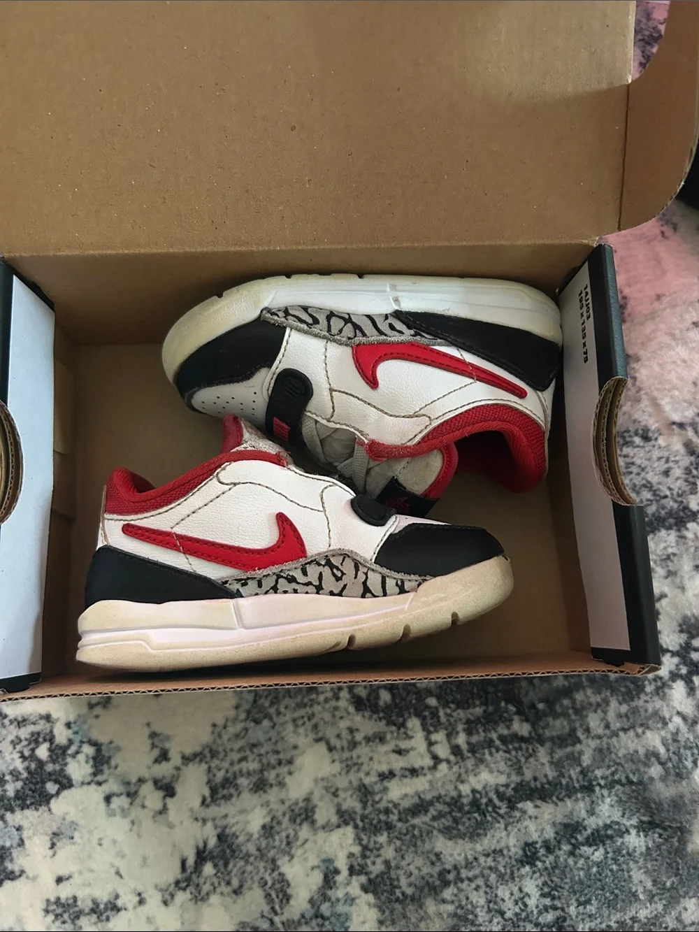 Nike Kids White, Red and Black Sneakers with Elephant Print Accent